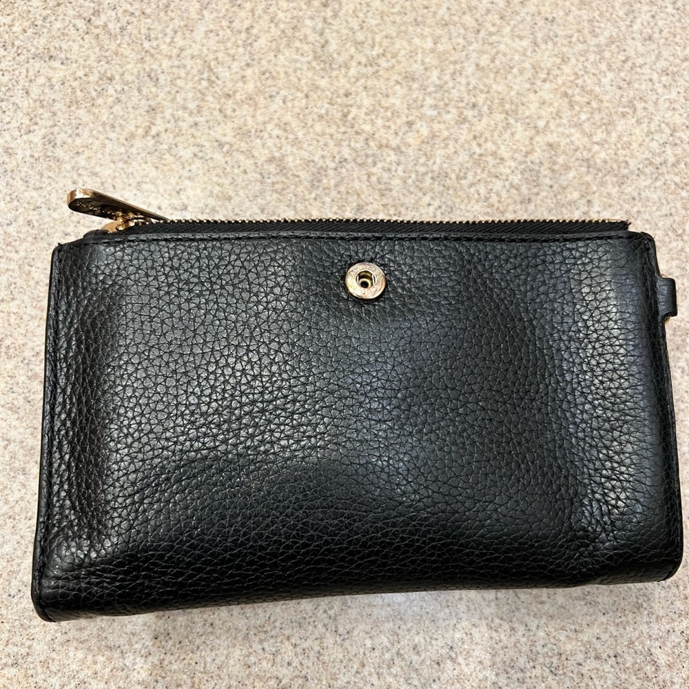 Michael Kors wallet, multi compartments for more than 8 card holders.